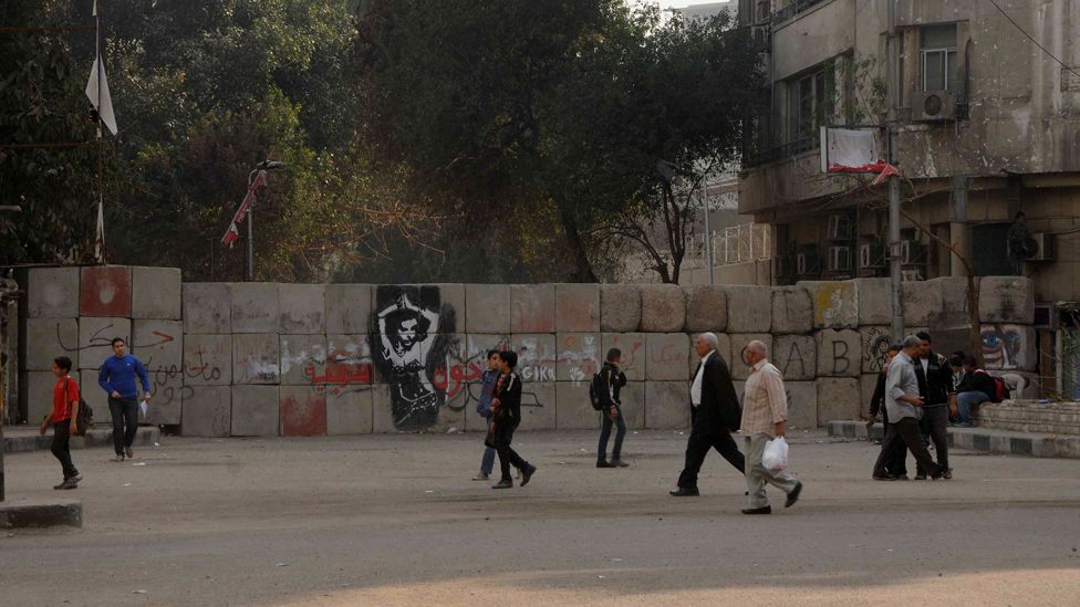 The wall blocking Simon Bolivar Square from Tahrir Square