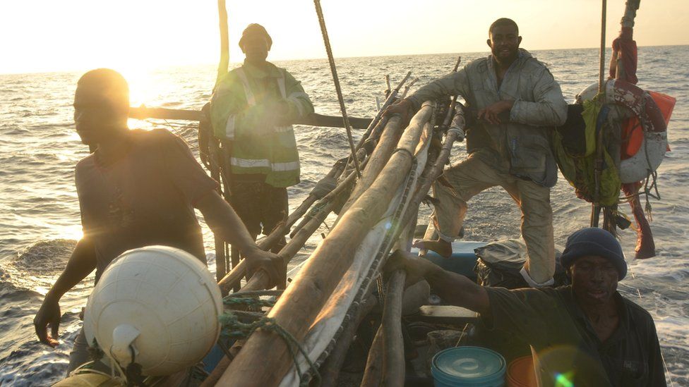 Crew members aboard the Kenyan fishing vessel sailing back to Mombasa port