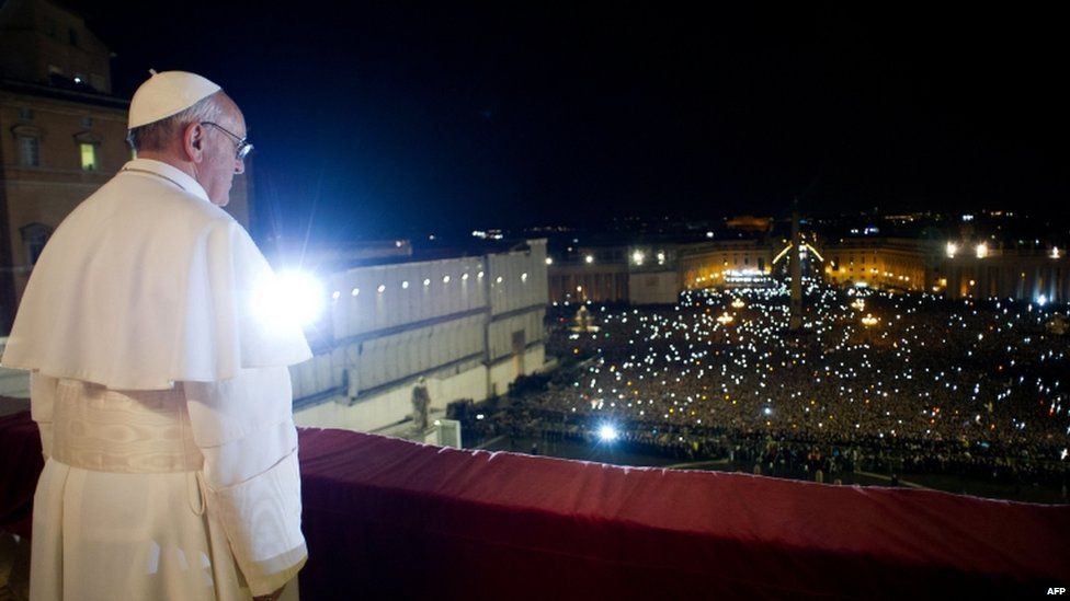 Argentina's Jorge Mario Bergoglio at the window of the balcony at St Peter's Basilica after being elected Pope
