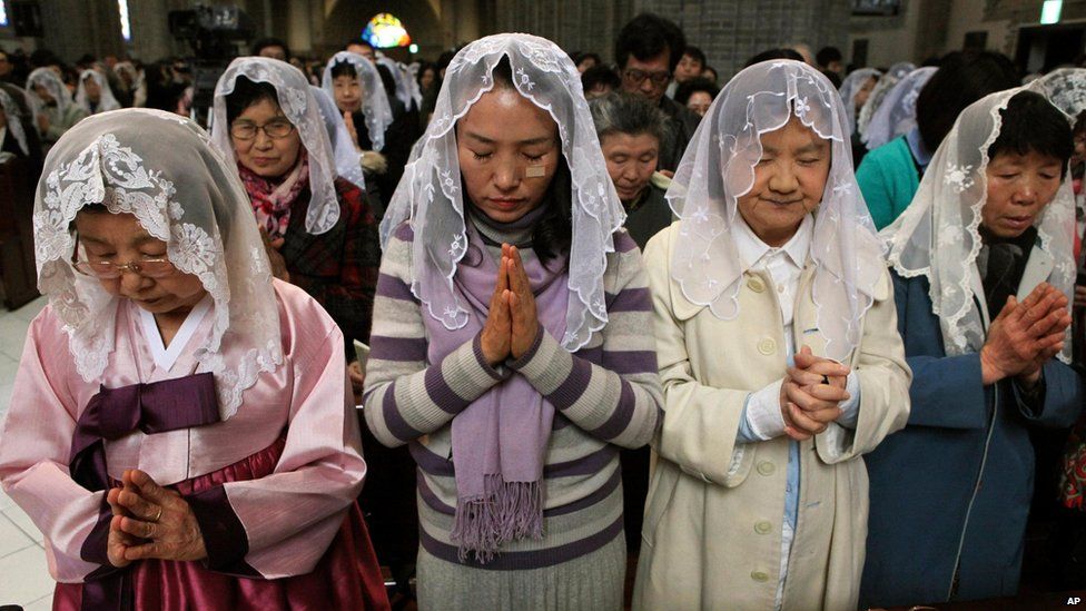 Catholics at the Myeongdong Cathedral in Seoul, South Korea, 31 March