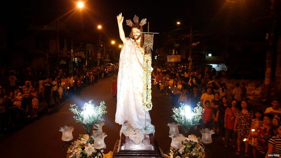 A procession of the risen Christ, on Easter Sunday at a church in Mandaluyong City, Manila, the Philippines.