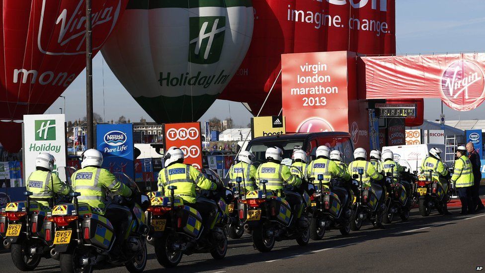 Police motorcycles lines up at the London marathon.