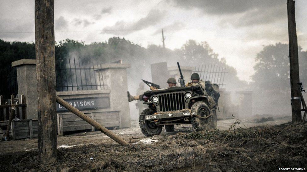 WWII re-enactment featuring American troops