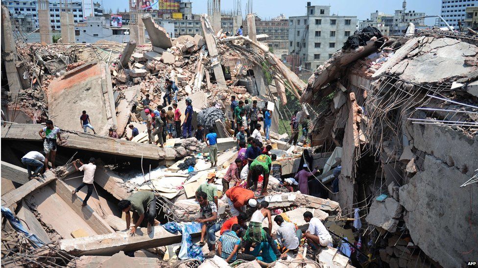 Bangladeshi civilian volunteers assist in rescue operations after an eight-storey building collapsed in Savar, on the outskirts of Dhaka, on April 24, 2013.