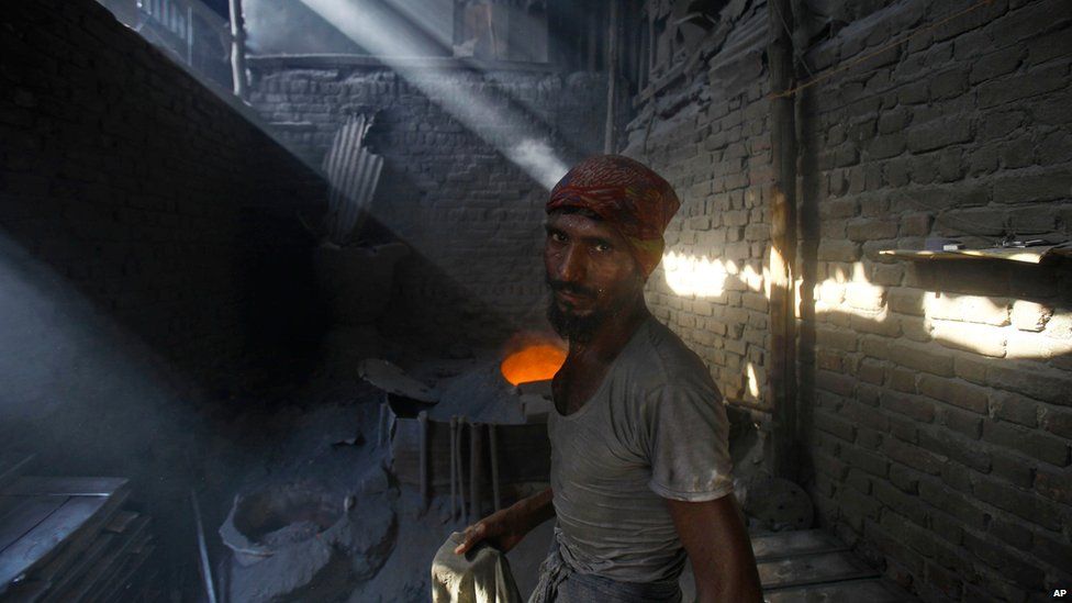 Worker in Mumbai, India, 1 May