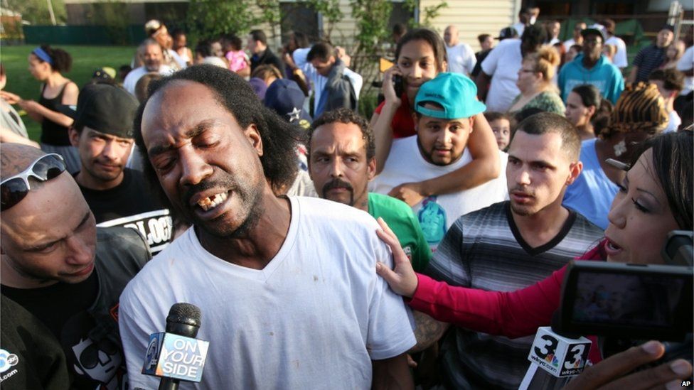 Neighbour Charles Ramsey, being interviewed by reporters, 6 May 2013