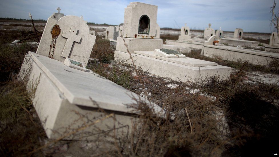 Tombs photographed in Epecuen, Argentina, on 7 May 2013
