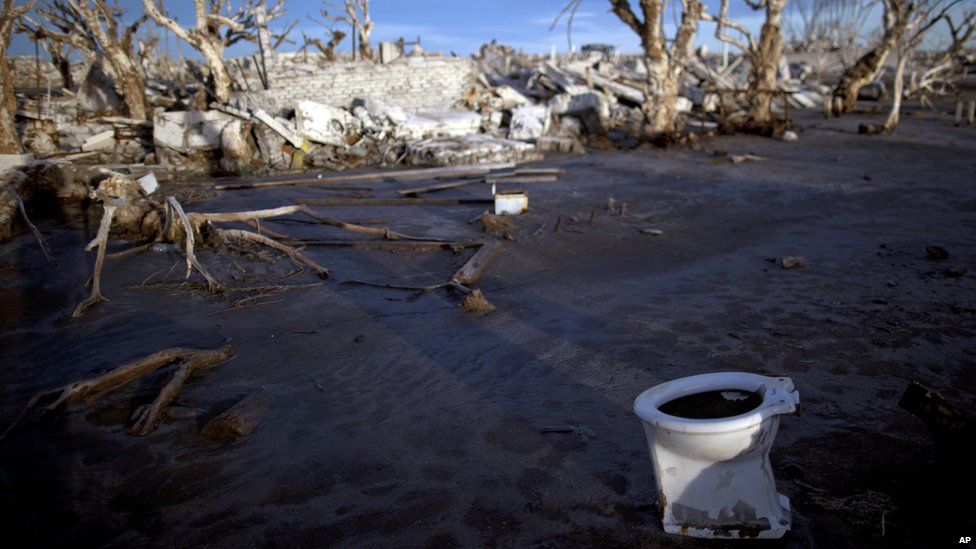 Toilet lies in the ruins of Epecuen, Argentina, on 7 May 2013