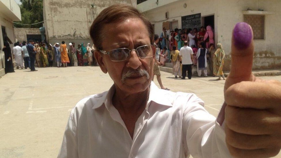 Voter in Karachi