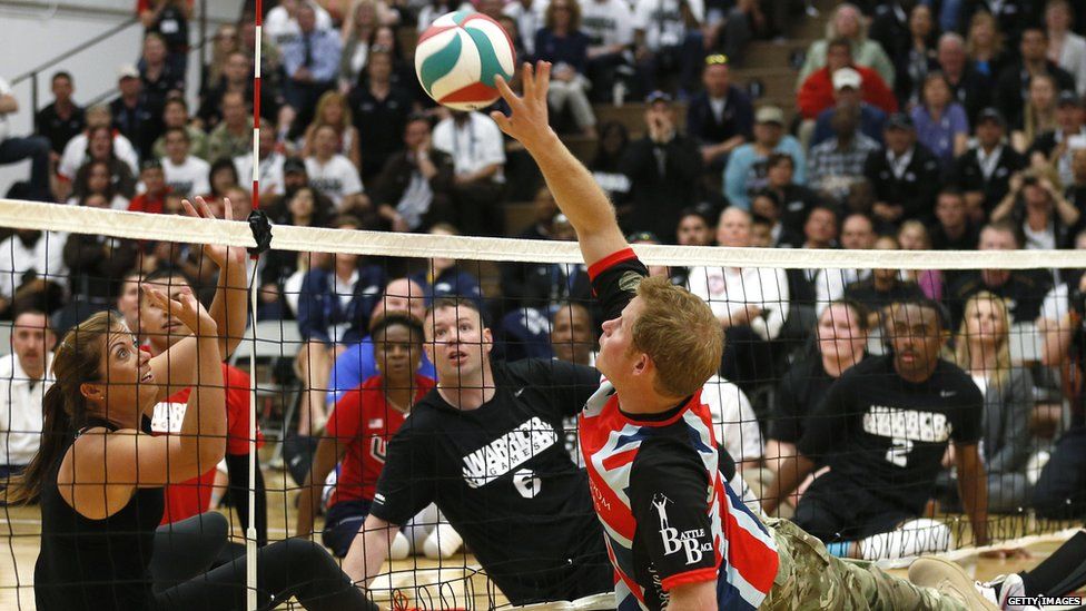 Prince Harry playing sitting volleyball at the Warrior Games