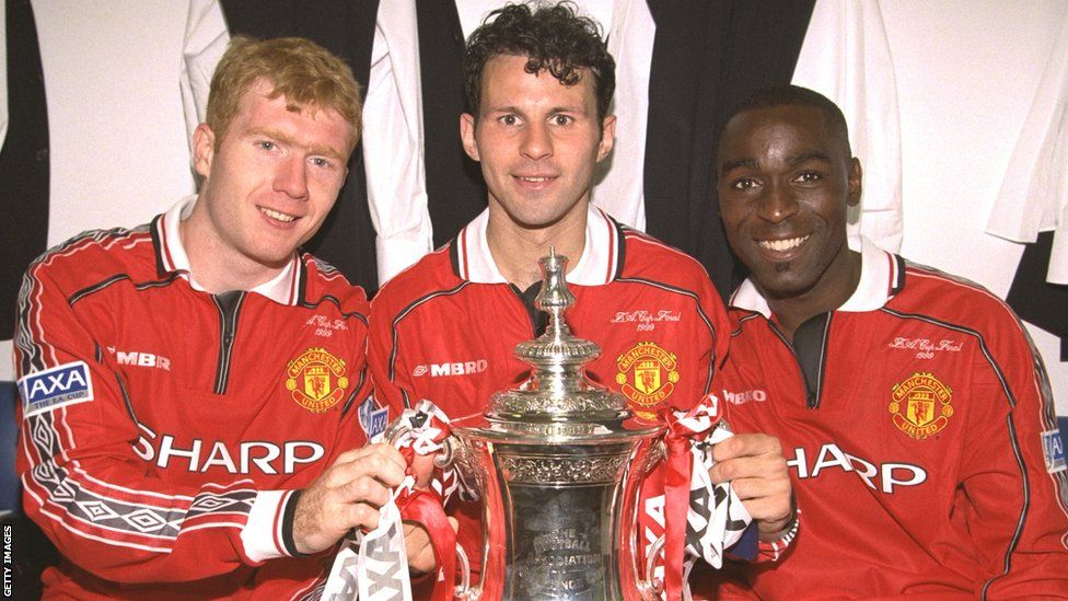 Paul Scholes (left), Ryan Giggs and Andy Cole (right) celebrate winning the FA Cup in 1999