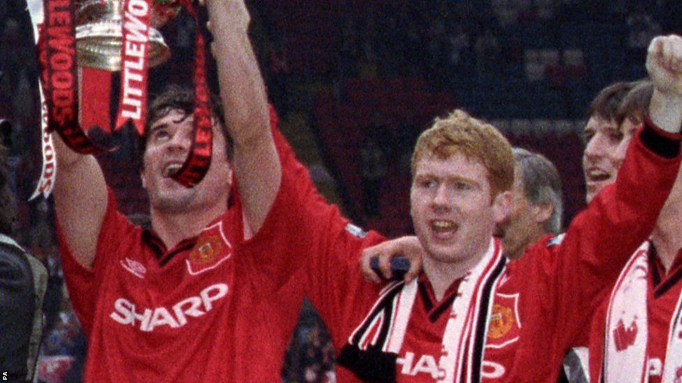 Paul Scholes (right) lifts the FA Cup in 1996 with team-mate Roy Keane