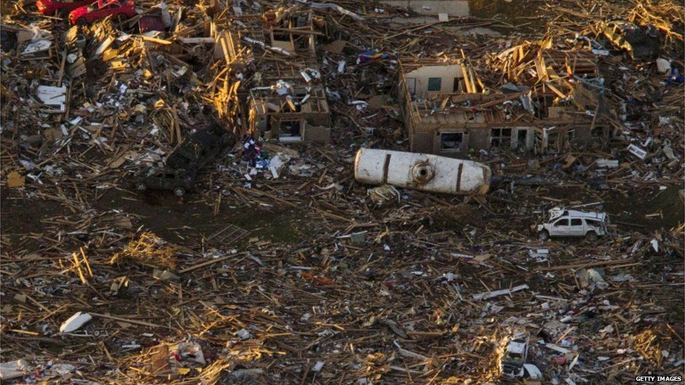 An aerial view of destroyed houses and buildings after a powerful tornado ripped through the area on 21 May 2013 in Moore, Oklahoma.