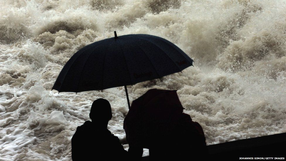 People watch the rising Lech river on June 2, 2013 in Landsberg am Lech, Germany