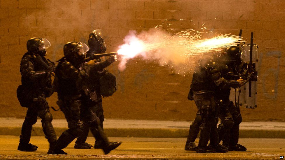 Police fire tear gas in Rio de Janeiro, Brazil, on 20 June 2013