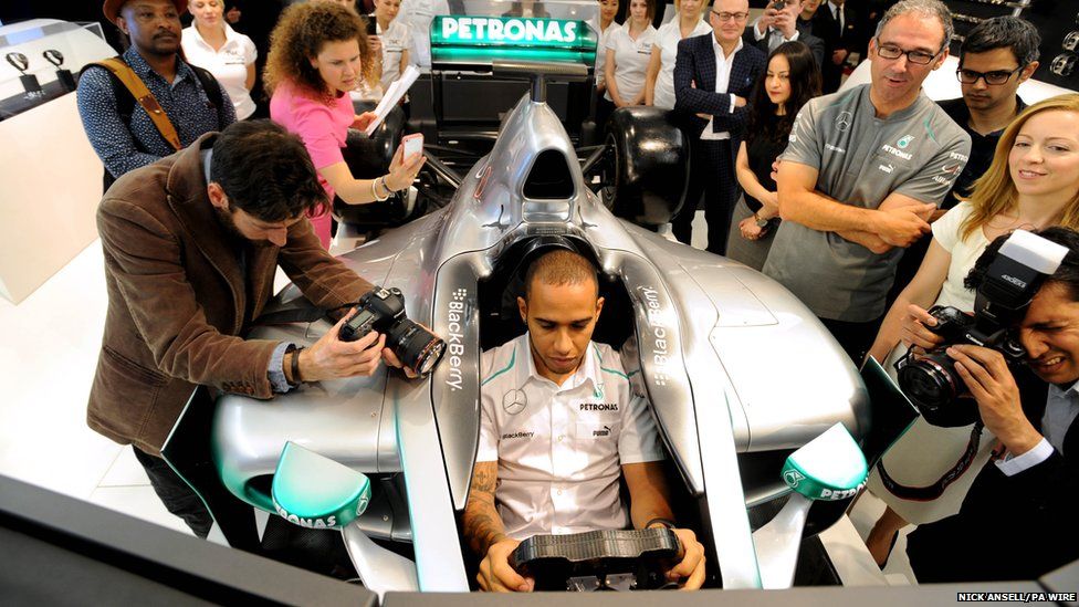 Lewis Hamilton in a formula one simulator