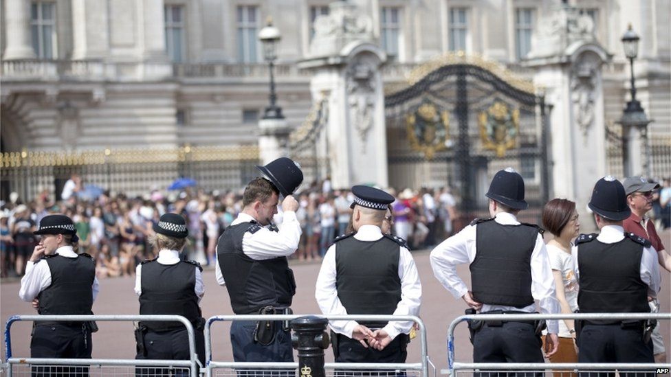 Police officers outside Buckingham Palace
