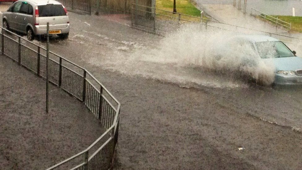 In pictures Flash flooding slows Greenock traffic BBC News