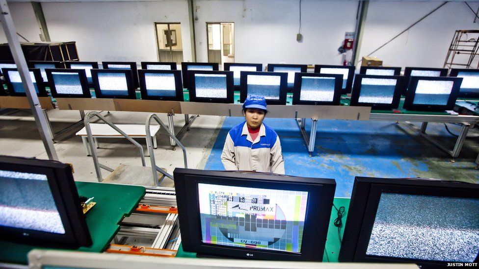 A workers in a television assembly factory in Vietnam