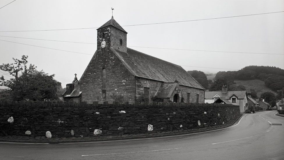 Church and slate wall, from Quiet Heroes, 2012 © Ken Griffiths