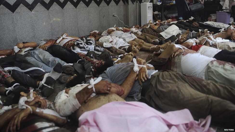 Bodies of members of the Muslim Brotherhood and supporters of deposed Egyptian President Mohamed Morsi lie in a room in a field hospital at the Rabaa Adawiya mosque in Cairo August 14, 2013