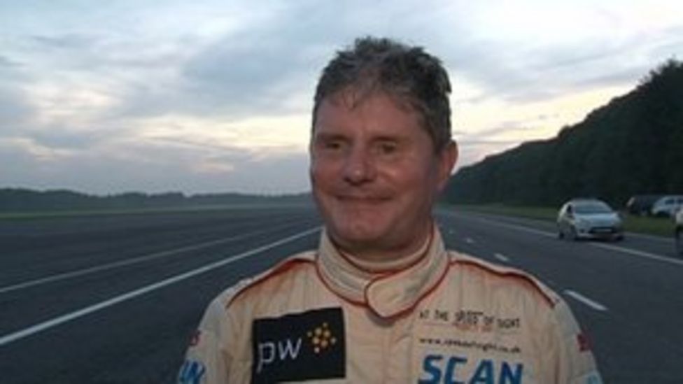 Mike Newman 'breaks blind land speed record' - BBC News