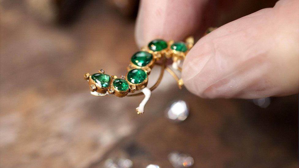 The Salamander brooch set in gold with emeralds and diamonds