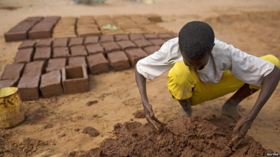 A makes bricks from mud, Dadaab, Kenya - Wednesday 9 October 2013