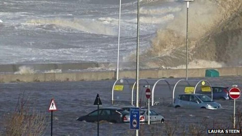 Flooding in New Brighton leaves cars and shops under water BBC News