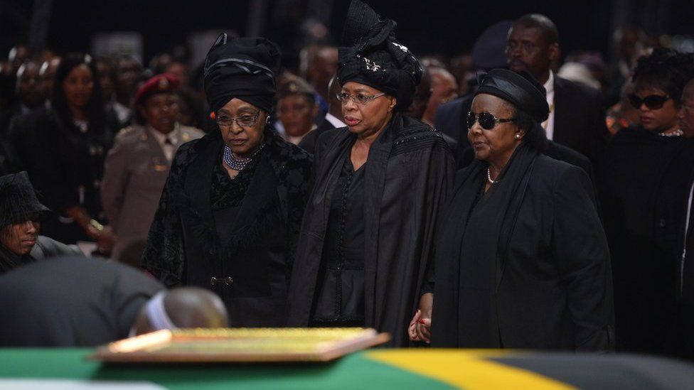 The ex-wife of Nelson Mandela, Winnie Mandela Madikizela (left), and the widow of Nelson Mandela, Graca Machel (centre)