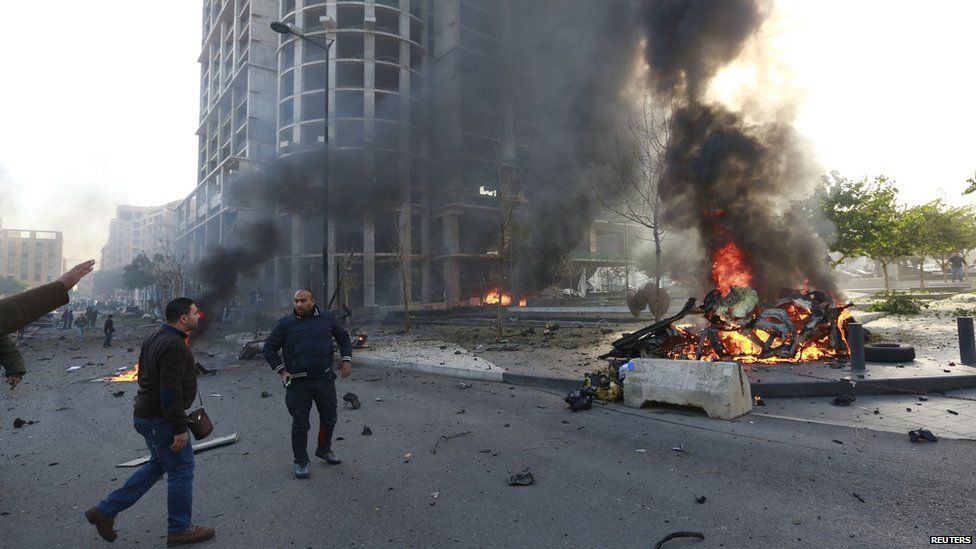 Smoke and flames after explosion in central Beirut (27 Dec 2013)