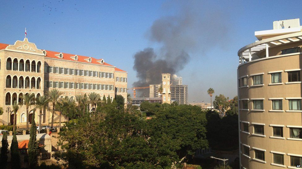 Smoke rises from a building in Beirut, Lebanon (Dec. 27, 2013)