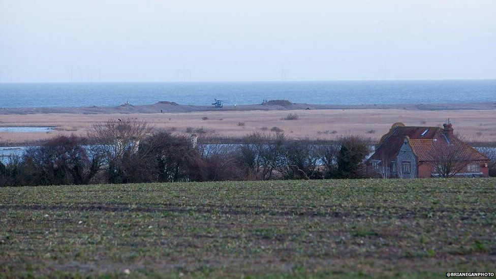 In pictures: Norfolk fatal US helicopter crash at Cley - BBC News