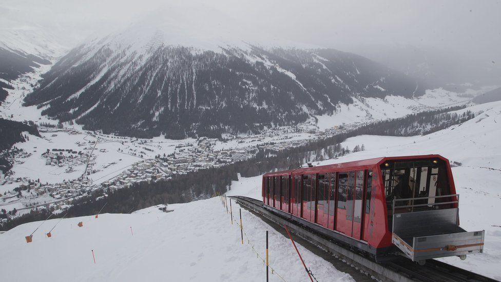 A cable train makes its way up the Weissfluhjoch mountain at the Parsenn ski arena in Davos, Switzerland