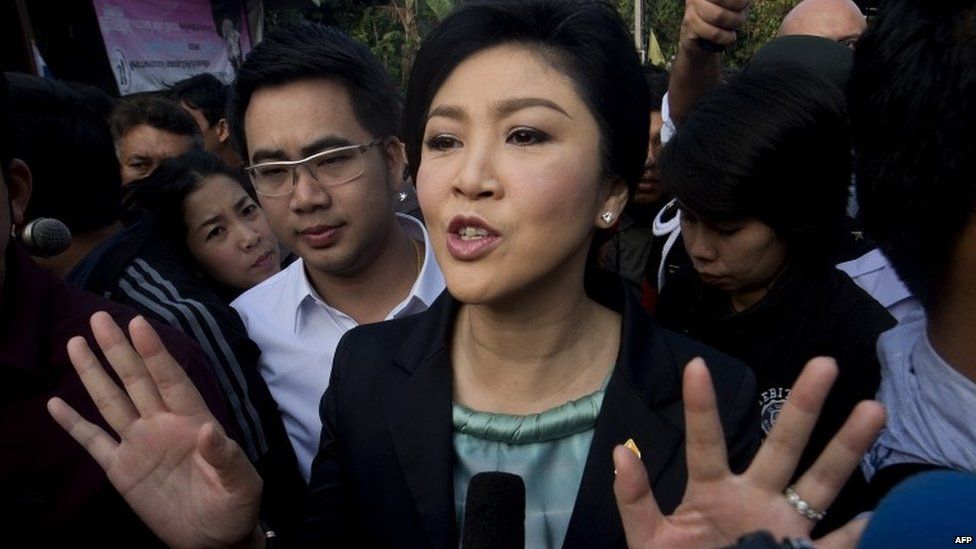 Thai Prime Minister Yingluck Shinawatra answers questions from the press after voting
