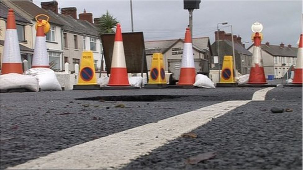Ballyhalbert Coastal surge leaves 'hole in road' BBC News