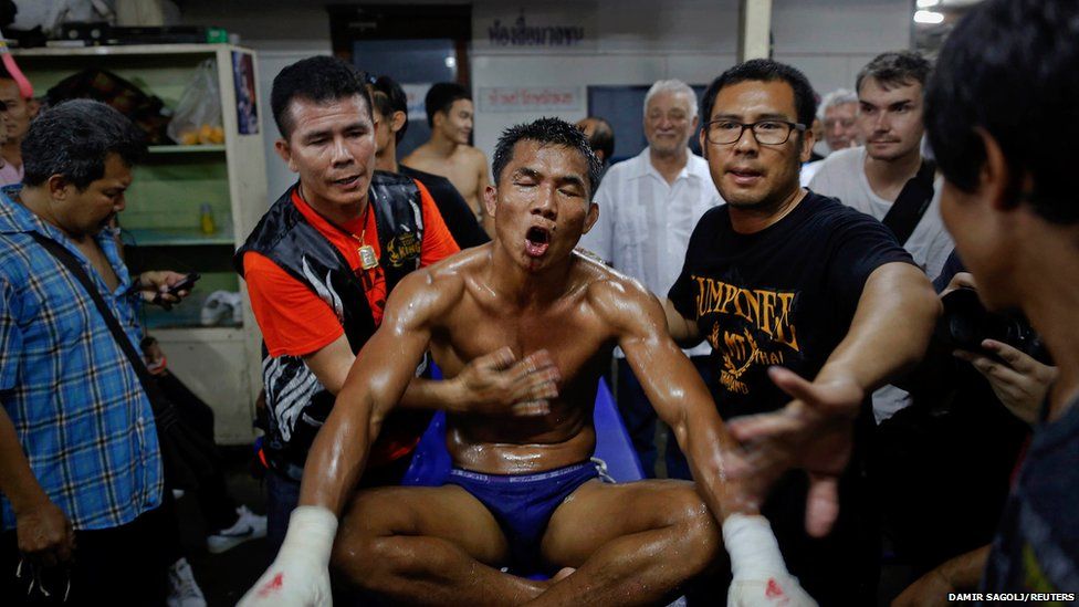 A fighter in his dressing room at the Lumpinee stadium in Bangkok