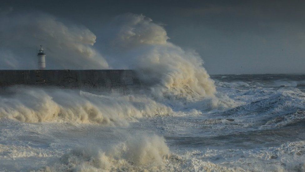 Atlantic storm batters the south coast light house and the harbour of Newhaven on February 14, 2014 in Newhaven, United Kingdom.
