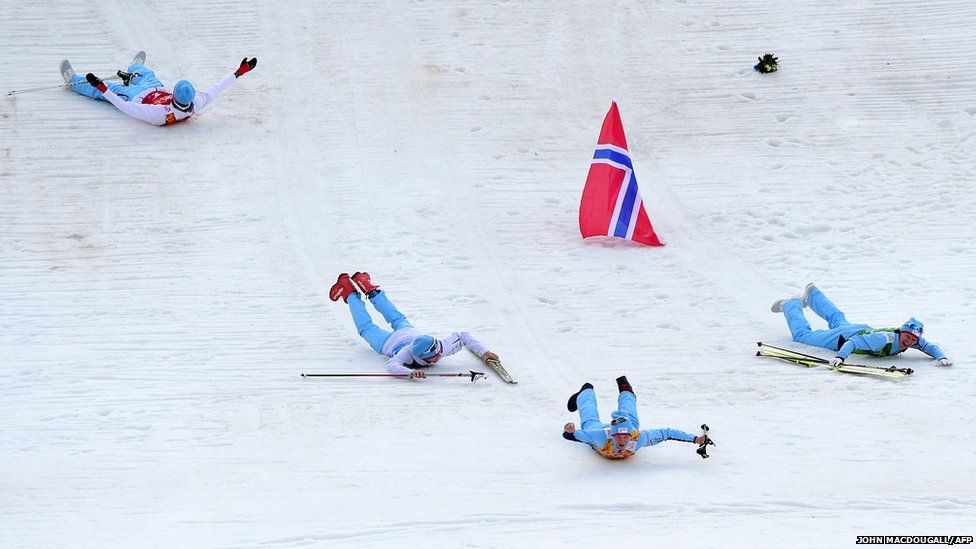 Norway's gold medalists Magnus Hovdal Moan, Magnus Krog, Haavard Klemetsen and Joergen Graabak celebrate