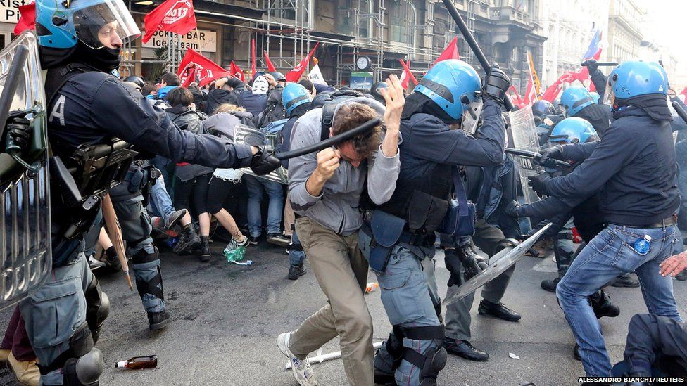 Demonstrators clash with police during a protest against austerity measures in downtown Rome.