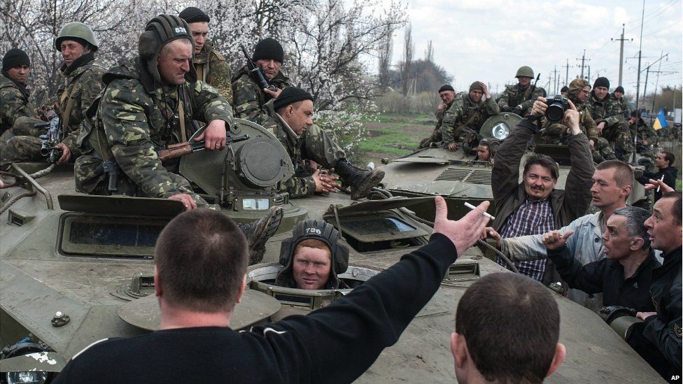 Crowds of people blocked a column of Ukrainian armoured vehicles on their way to the centre of Kramatorsk - 16 April 2014