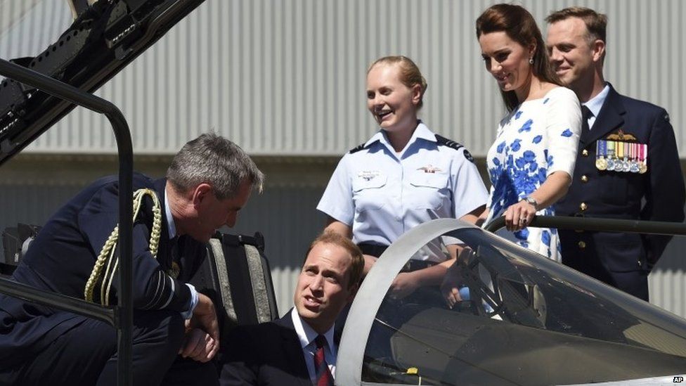 Chief of Air Force Air Marshall Geoff Brown, left, talks with Britain"s Prince William
