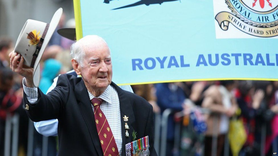 A veteran tips his hat during the ANZAC Day parade, in Sydney, on Friday, 25 April, 2014