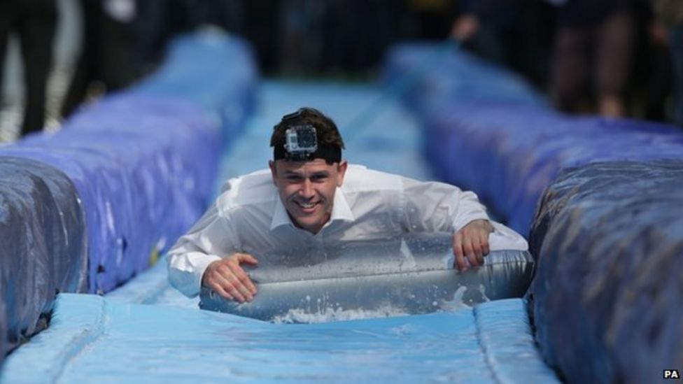 Bristol giant water slide sees thrillseekers soaked BBC News
