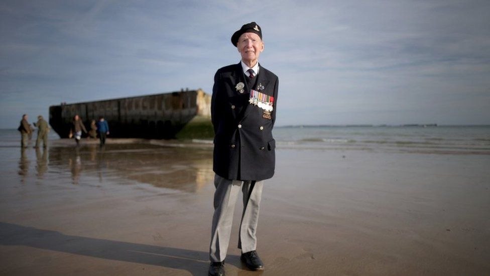 Bill Price, aged 99, on a beach in France