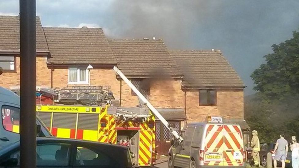 Girl dies in Carmarthen fire a year after brother's cot death - BBC News