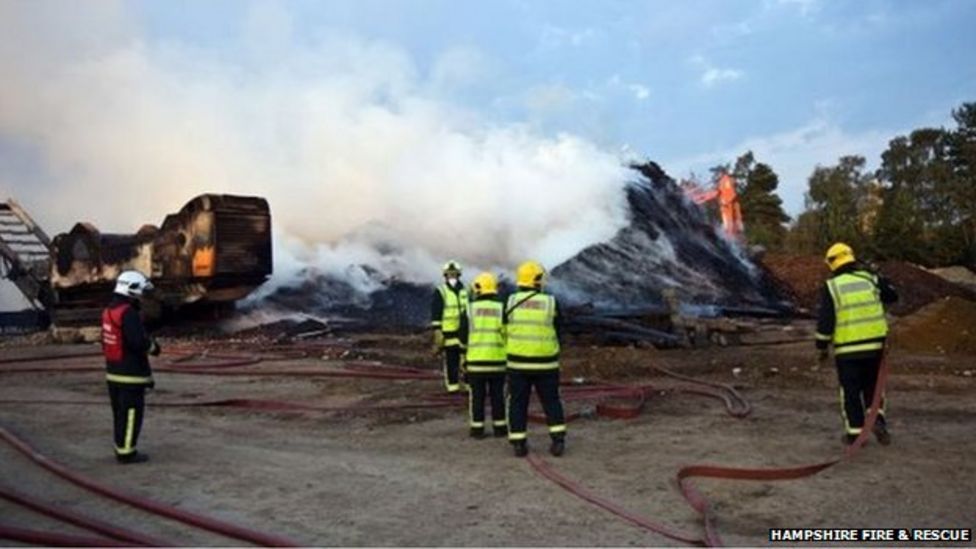 Wood chips on fire in Eversley storage yard BBC News