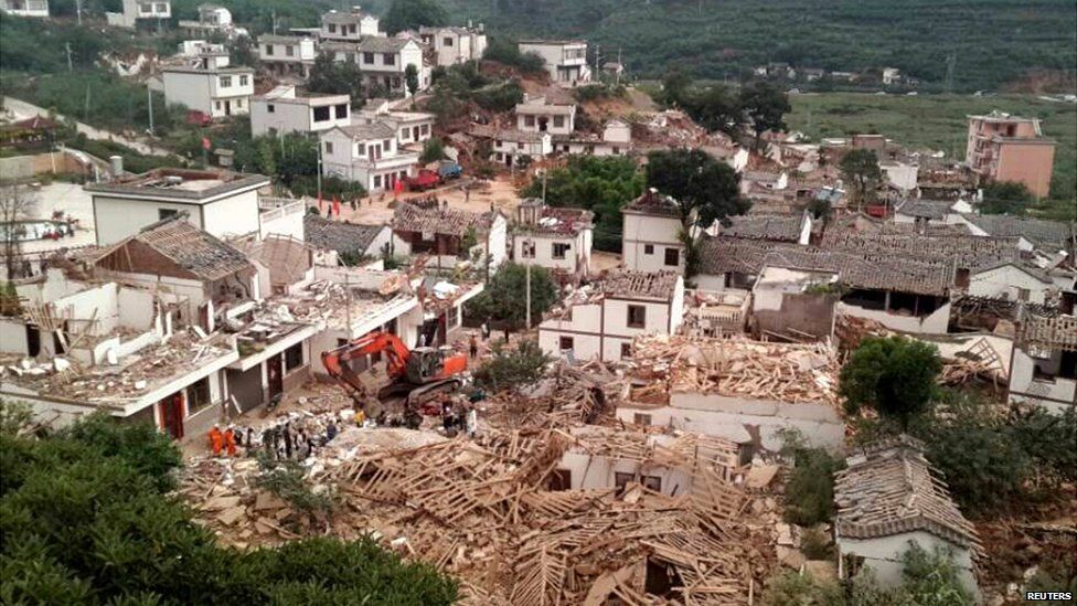 An aerial view of collapsed houses after the earthquake in Yunnan province - 3 August 2014