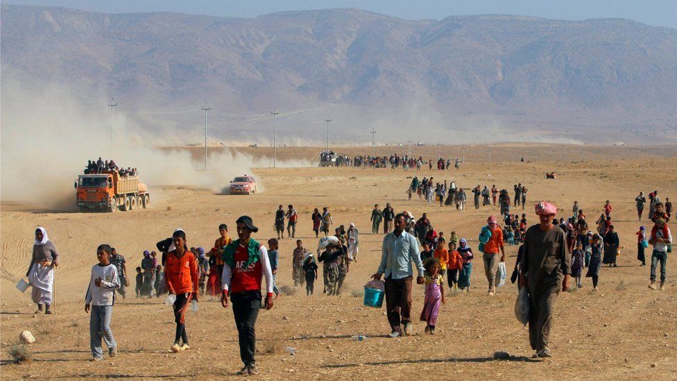 Refugees flee to the Syrian border