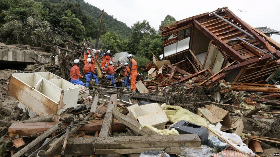 Rescue workers restart rescue operations at a landslide site in Hiroshima, Hiroshima Prefecture, western Japan, 22 August 2014